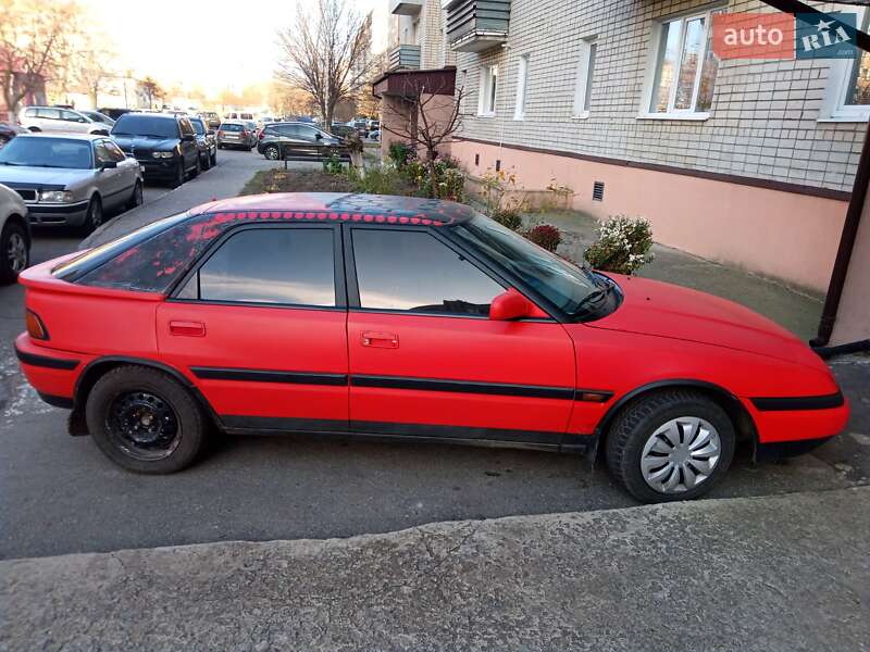 Седан Mazda 323 1991 в Вараші фото 2 Седан Mazda 323 1991 в Вараші