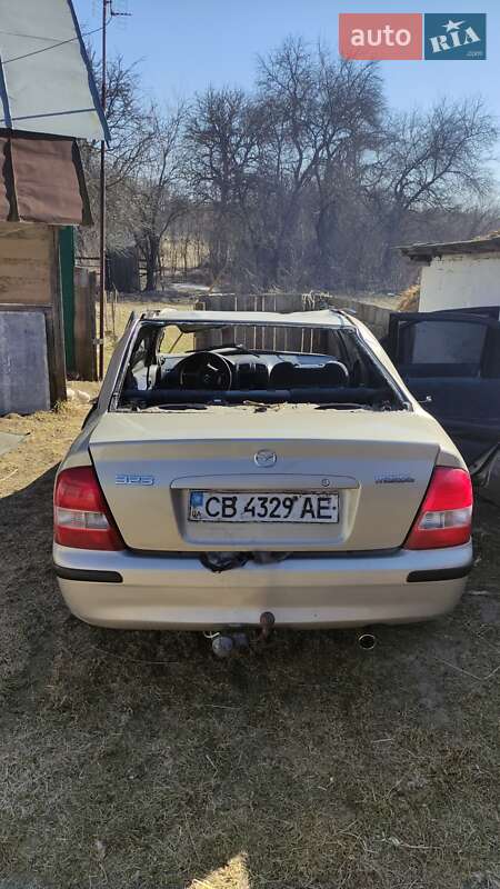 Седан Mazda 323 1999 в Сосницях