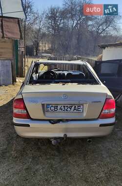 Седан Mazda 323 1999 в 