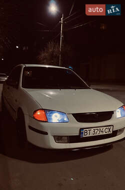 Седан Mazda 323 1999 в Бару