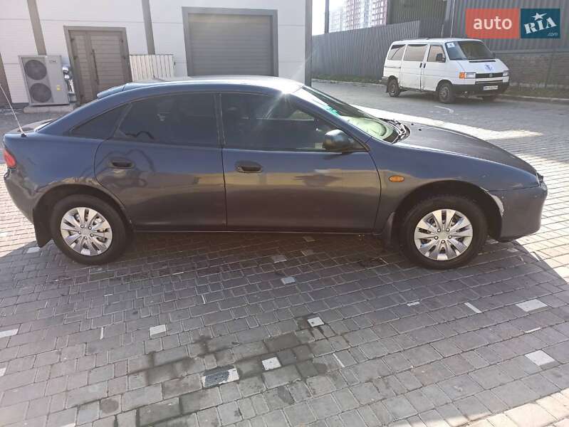 Хетчбек Mazda 323 1997 в Авангарді фото 5 Хетчбек Mazda 323 1997 в Авангарді