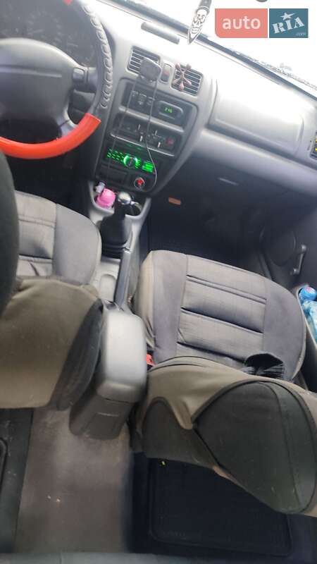 Седан Mazda 323 1997 в Киеве
