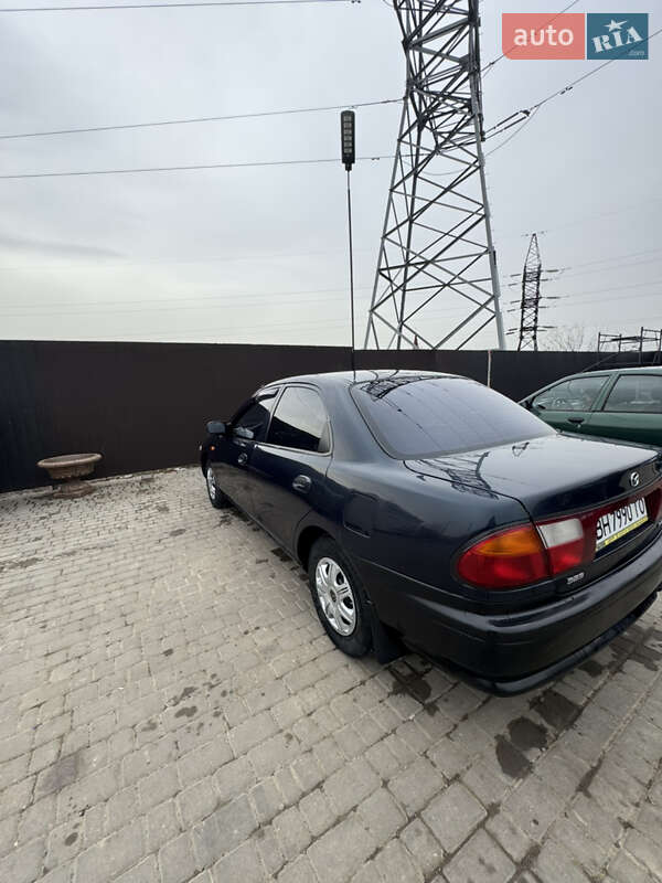 Седан Mazda 323 1997 в Одессе фото 11 Седан Mazda 323 1997 в Одессе