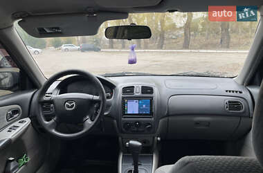 Хэтчбек Mazda 323 2002 в 