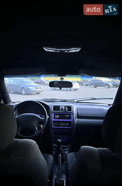 Хэтчбек Mazda 323 1998 в 