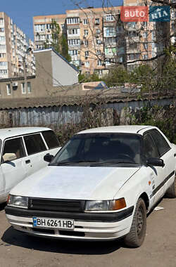 Седан Mazda 323 1990 в 