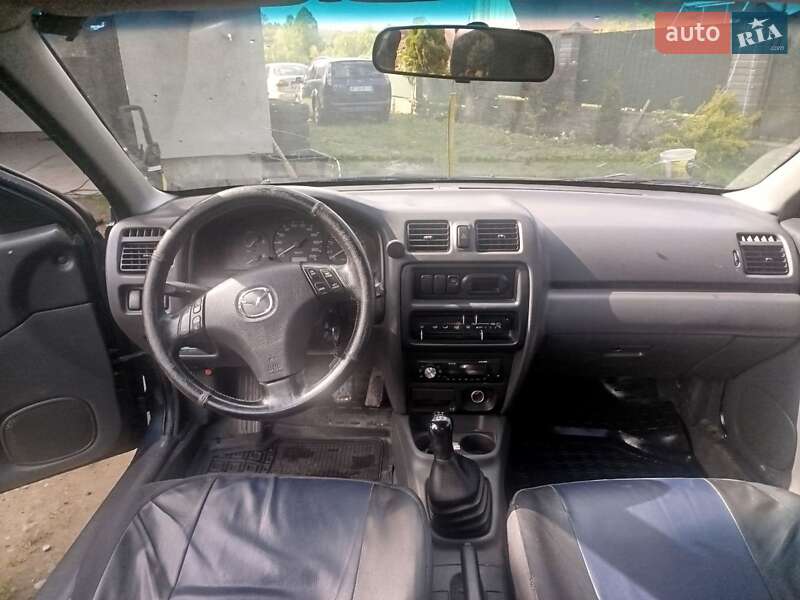 Седан Mazda 323 1997 в 