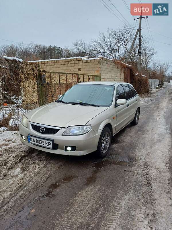 Хэтчбек Mazda 323 2003 в 