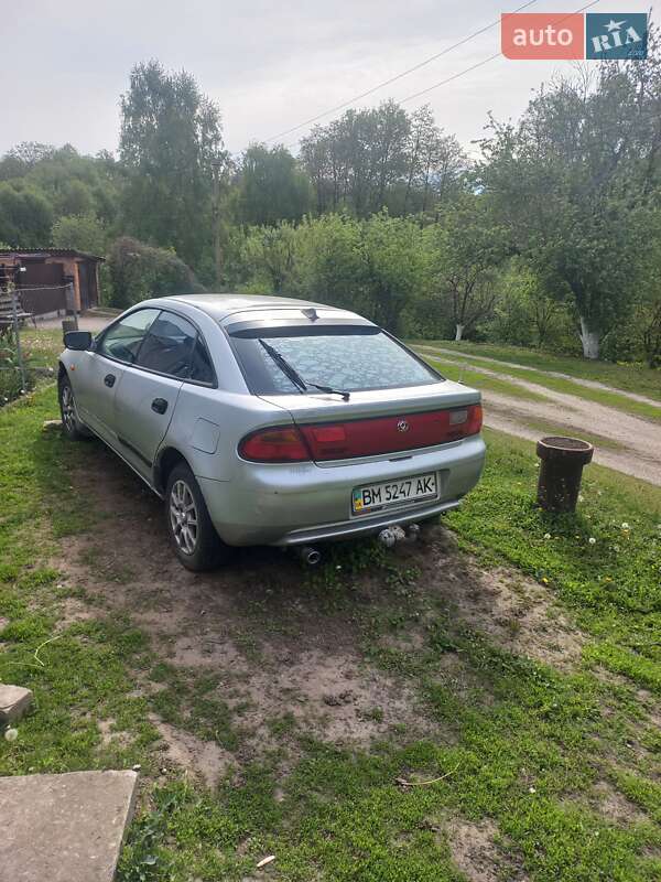 Хетчбек Mazda 323 1996 в Бурині фото 4 Хетчбек Mazda 323 1996 в Бурині