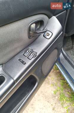 Хетчбек Mazda 323 1996 в 