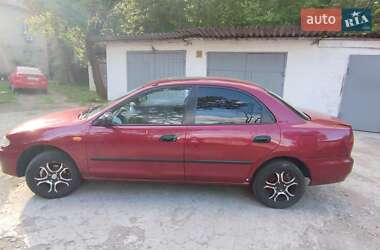 Седан Mazda 323 1996 в 