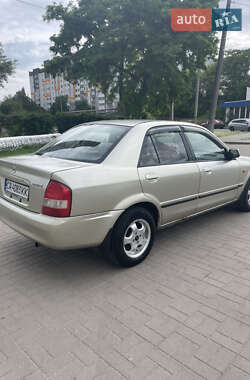 Седан Mazda 323 1998 в 