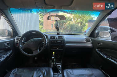 Седан Mazda 323 1998 в 