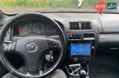 Хэтчбек Mazda 323 1998 в 