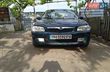 Седан Mazda 323 1998 в Подільську