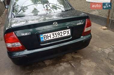 Седан Mazda 323 1998 в 