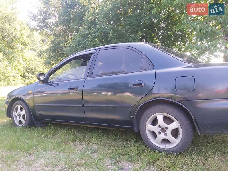 Седан Mazda 323 1995 в Хмельницком фото 6 Седан Mazda 323 1995 в Хмельницком