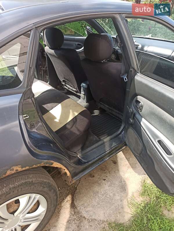 Седан Mazda 323 1998 в Белой Церкви фото 14 Седан Mazda 323 1998 в Белой Церкви