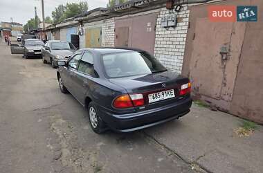 Седан Mazda 323 1998 в 