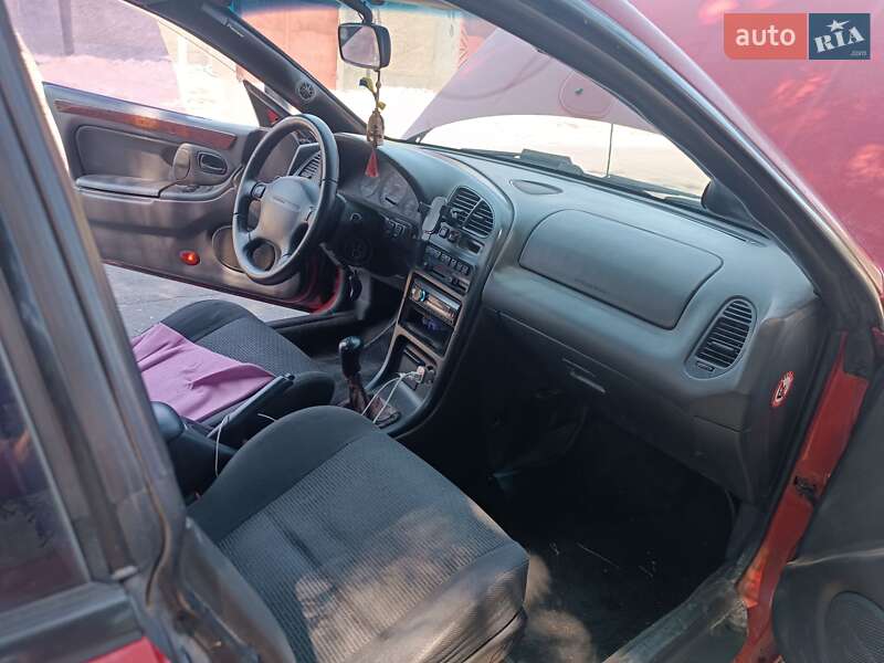 Хэтчбек Mazda 323 1996 в Одессе