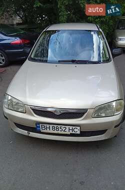 Седан Mazda 323 1999 в 
