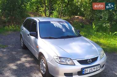 Хэтчбек Mazda 323 2003 в 