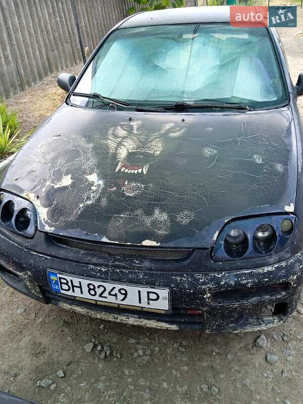 Хэтчбек Mazda 323 1994 в Одессе фото Хэтчбек Mazda 323 1994 в Одессе