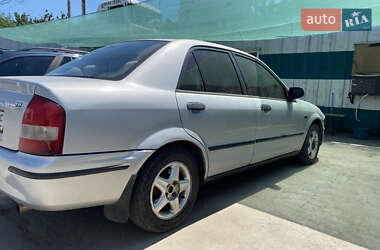 Седан Mazda 323 1998 в 