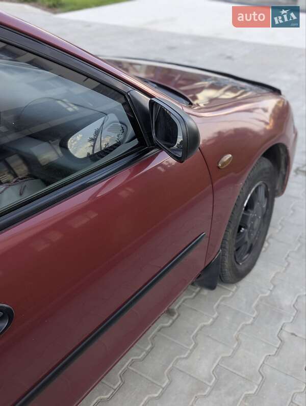 Седан Mazda 323 1996 в Кропивницькому фото 3 Седан Mazda 323 1996 в Кропивницькому