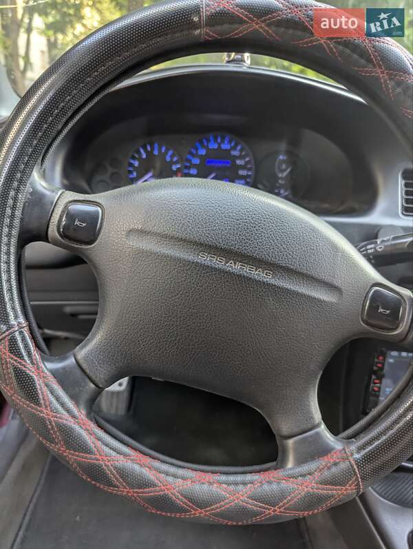 Седан Mazda 323 1996 в Кропивницькому фото 9 Седан Mazda 323 1996 в Кропивницькому