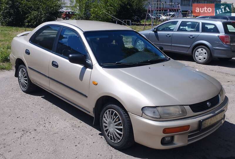 Седан Mazda 323 1995 в Кременчуці фото 5 Седан Mazda 323 1995 в Кременчуці