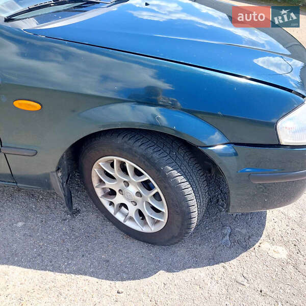 Седан Mazda 323 1998 в Вінниці фото 4 Седан Mazda 323 1998 в Вінниці