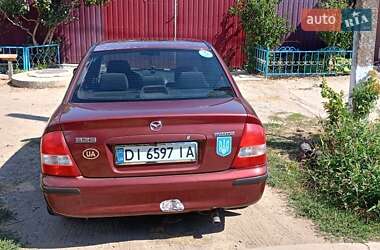 Седан Mazda 323 1999 в 