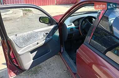 Седан Mazda 323 1999 в 