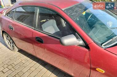 Хэтчбек Mazda 323 1998 в 