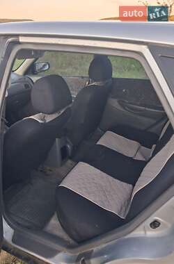Хэтчбек Mazda 323 1998 в 
