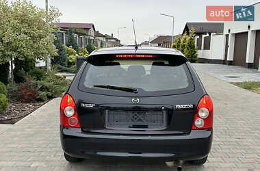 Хэтчбек Mazda 323 2003 в 