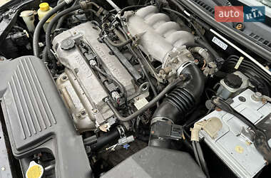 Хэтчбек Mazda 323 2003 в 