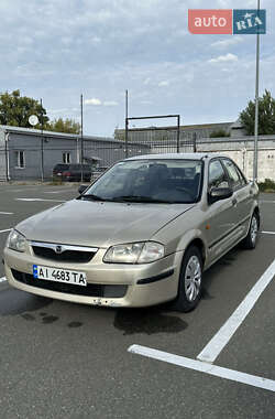 Седан Mazda 323 1999 в 