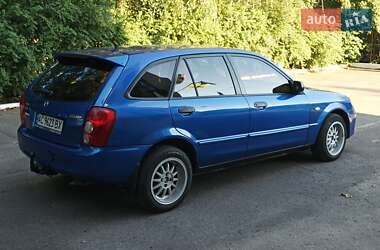 Хэтчбек Mazda 323 2003 в 