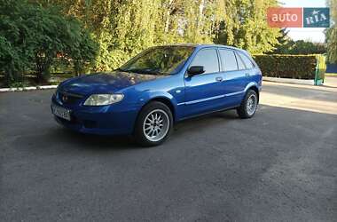 Хэтчбек Mazda 323 2003 в 