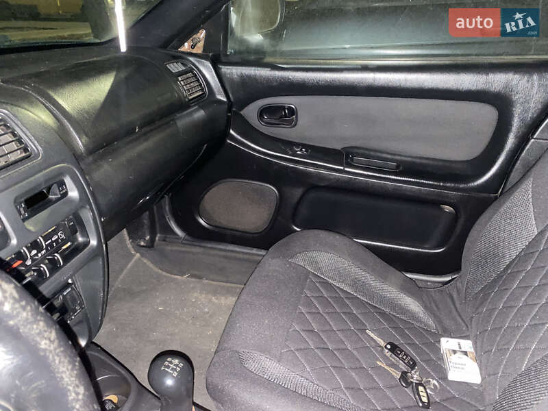 Хетчбек Mazda 323 1997 в Хмельницькому фото 11 Хетчбек Mazda 323 1997 в Хмельницькому