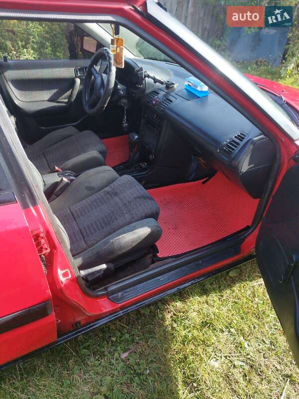 Хэтчбек Mazda 323 1994 в Нововолынске фото 9 Хэтчбек Mazda 323 1994 в Нововолынске