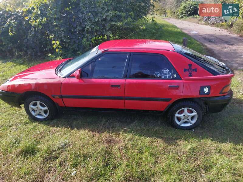 Хэтчбек Mazda 323 1994 в Нововолынске фото 6 Хэтчбек Mazda 323 1994 в Нововолынске