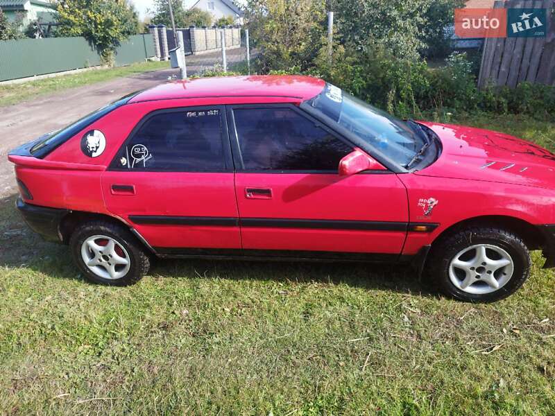 Хэтчбек Mazda 323 1994 в Нововолынске фото 5 Хэтчбек Mazda 323 1994 в Нововолынске