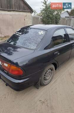 Седан Mazda 323 1998 в Зміїві