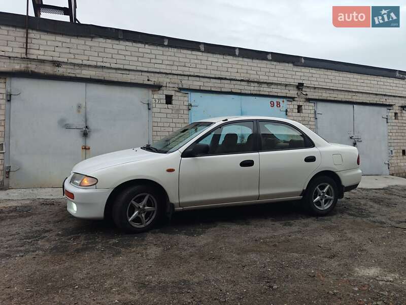 Седан Mazda 323 1996 в Днепре фото 6 Седан Mazda 323 1996 в Днепре