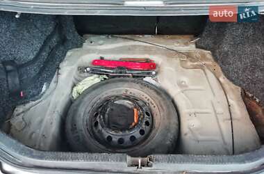 Седан Mazda 323 1996 в  фото 9 Седан Mazda 323 1996 в