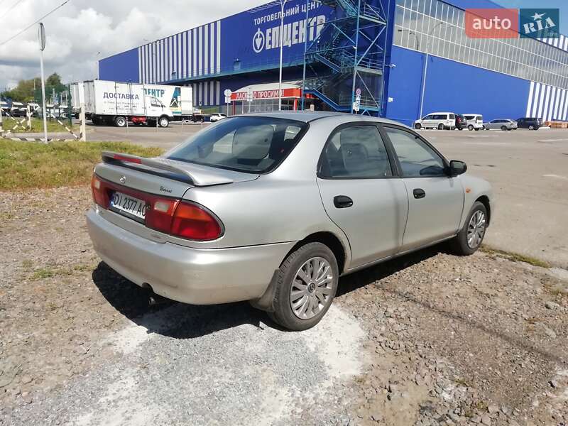 Седан Mazda 323 1996 в Ровно фото 13 Седан Mazda 323 1996 в Ровно