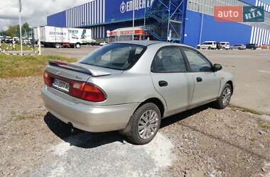 Седан Mazda 323 1996 в  фото 13 Седан Mazda 323 1996 в